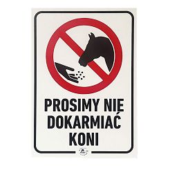 Information board in Polish “Prosimy nie dokarmiać koni”