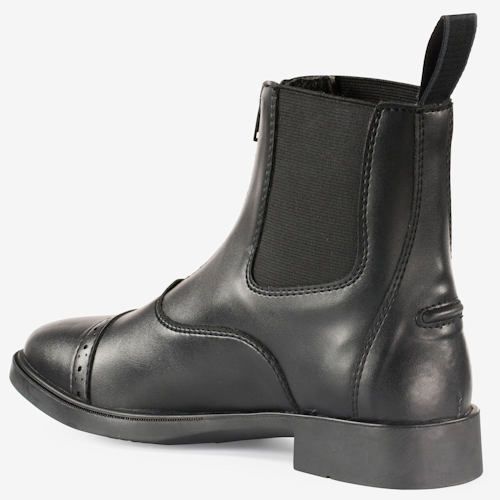 Gumowe wstawki po bokach dopasowują but do nogi.