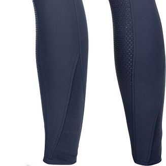 Dół nogawki z elastyczną wstawką, zwiększającą dopasowanie spodni do łydki oraz ułatwiające przełożenie stopy.