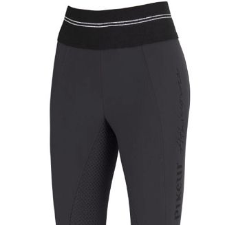 Z lewej strony pionowy, błyszczący  napis 