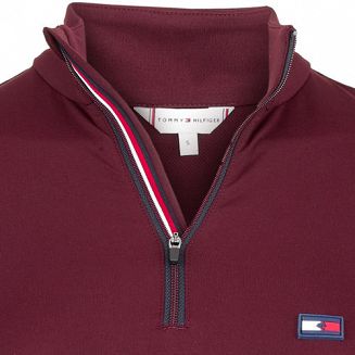 z przodu po lewej stronie gumowe logo TOMMY HILFIGER